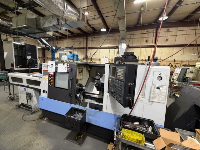 Daewoo Doosan #Puma-240C, CNC lathe, Fanuc Control, 10" chuck, 3" bar, LNS QLS80S2 barfeed, 2013 - Image 1