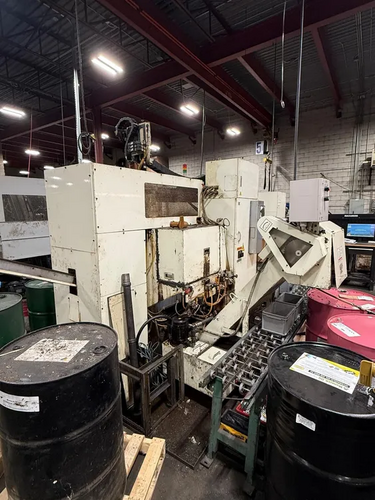 Fuji #FS-4, Cnc Lathe, w/ robot loader, 4000 RPM, 10/15 HP, 8" chuck, Fanuc 21I-TB cnc, 11.8" stroke, 2005 - Image 2