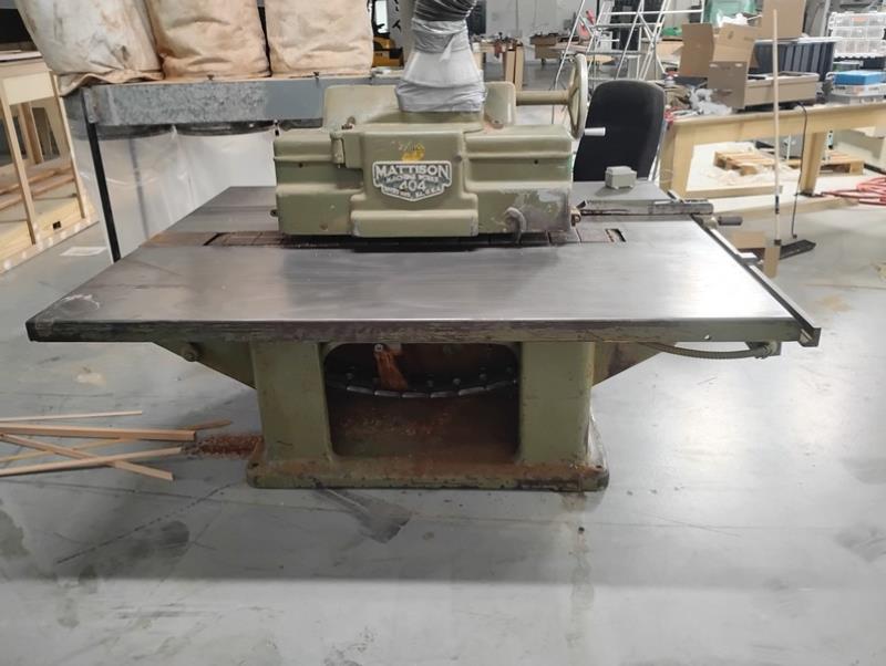 Mattison #404, striaght line rip saw, 15 HP, 14" diameter Blade, 1.5" dia arbor, variable speed, 65" x 77" - Image 1