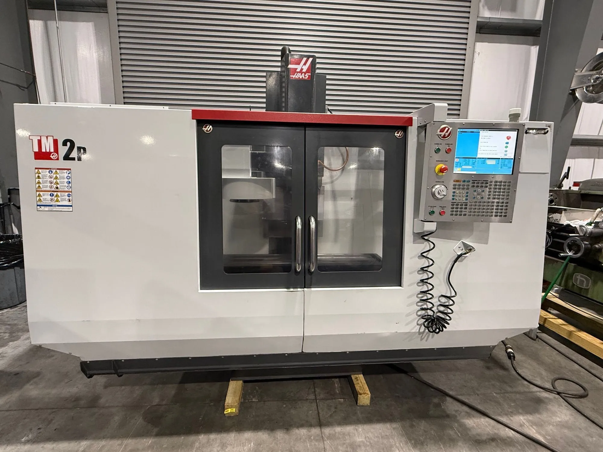Haas #TM-2P, CNC vertical machining center, 10 automatic tool changer, 40" X, 16" Y, 16" Z, 6000 RPM, #40 - Image 1