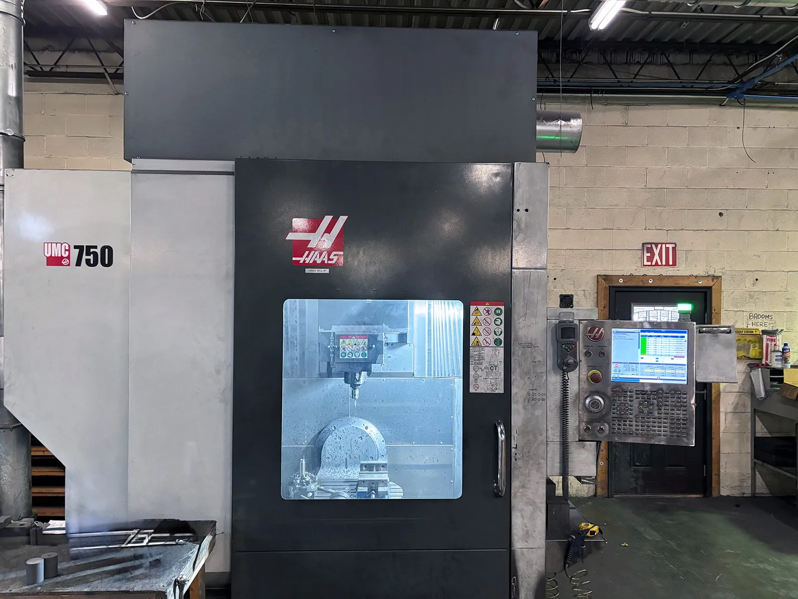 Haas #UMC750, CNC vertical machining center, 40 automatic tool changer, 30" X, 20" Y, 20" Z, 8000 RPM, #40 - Image 1