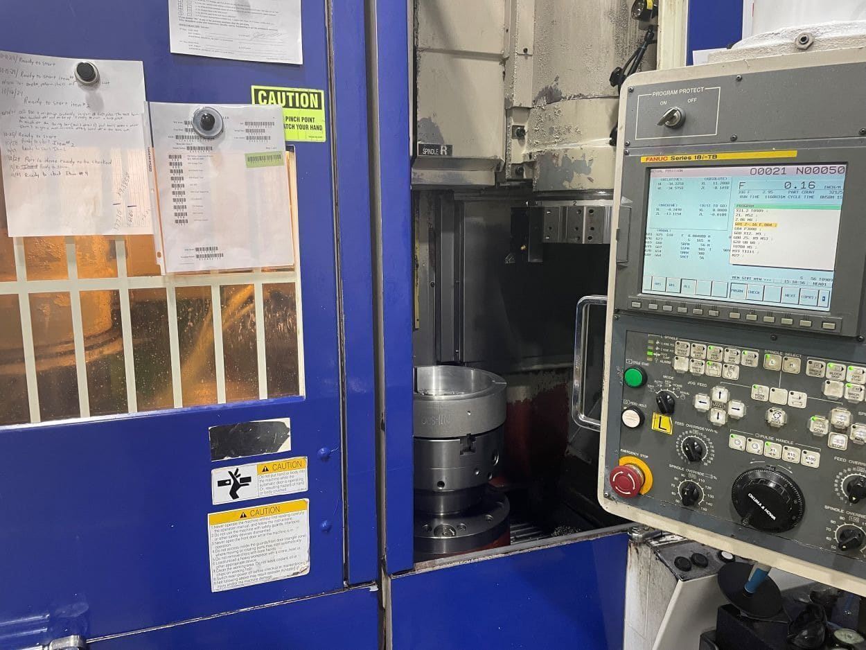 Okuma #2SP-V40, vertical turret lathe, Fanuc 18iTB, (2) 3-jaw 12" chucks, 10.4" X, 17.7" Z, 25-2500 RPM, 2007 - Image 1