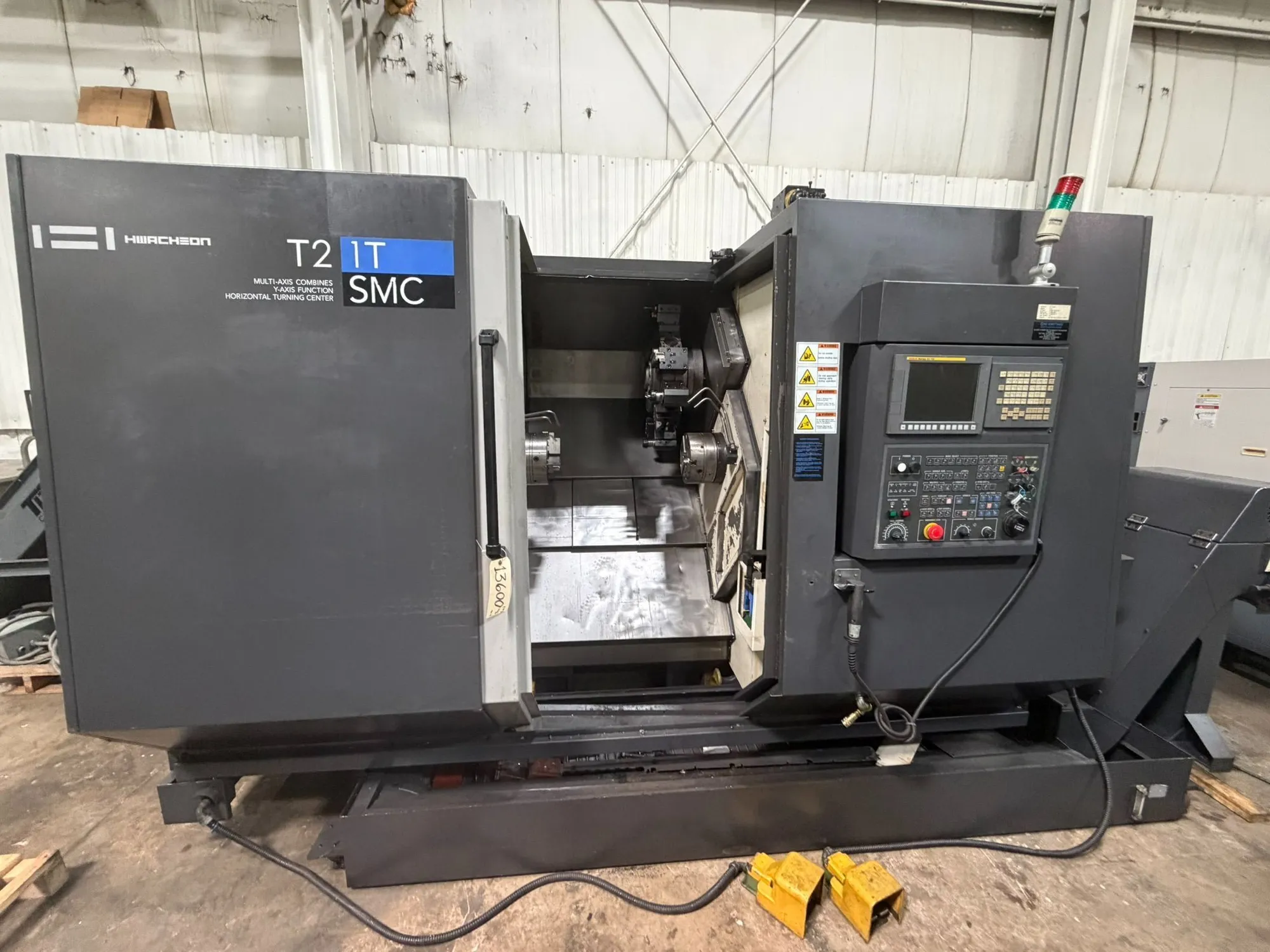 Hwacheon #T2-1T-SMC, CNC lathe, Twin Spindle, 18.1" turning diameter, 20 HP, 5000 RPM, 12-position turret - Image 1