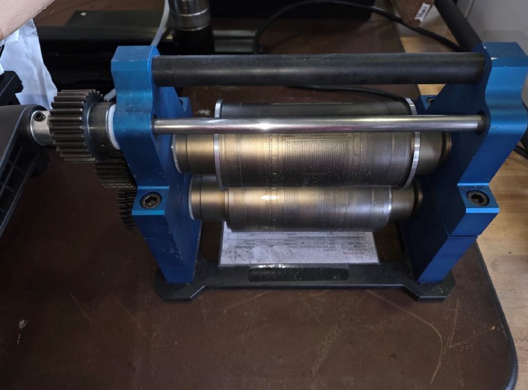 Precision, dual-roller calendaring press, graphite rollers, synchronized geared roller system - Image 1