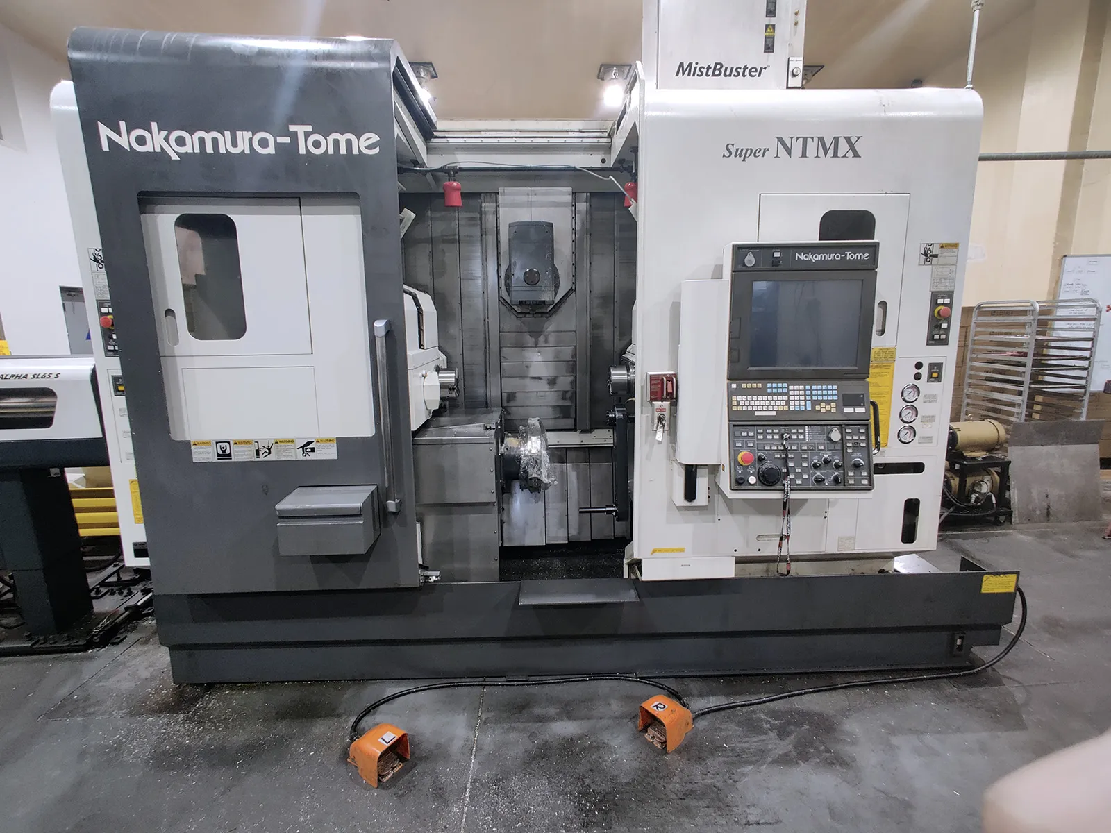 Nakamura Tome #Super-NTMX, CNC turn-mill, 8" swing, 38.5" centers, 7" chuck, 2" bar, twin spindle, Y-axis - Image 1