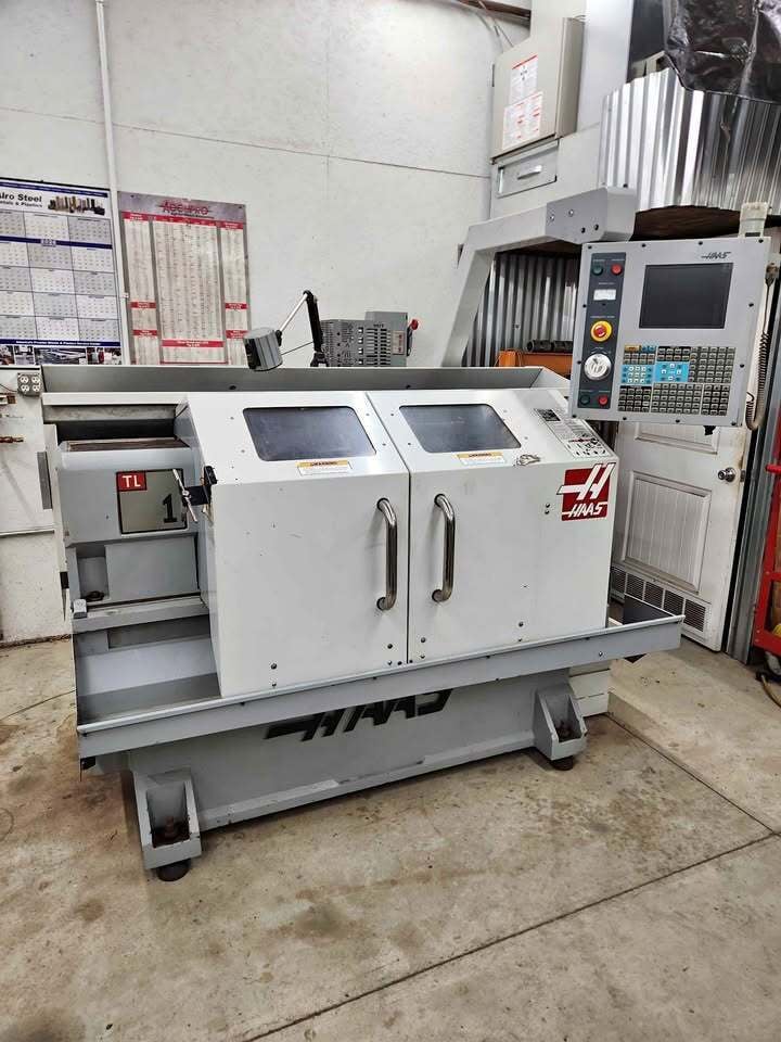 Haas #TL-1, CNC Lathe, 20" swing, 30" centers, 16" turning diameter, 8" chuck, 12 HP, 2000 RPM, 4-station - Image 1
