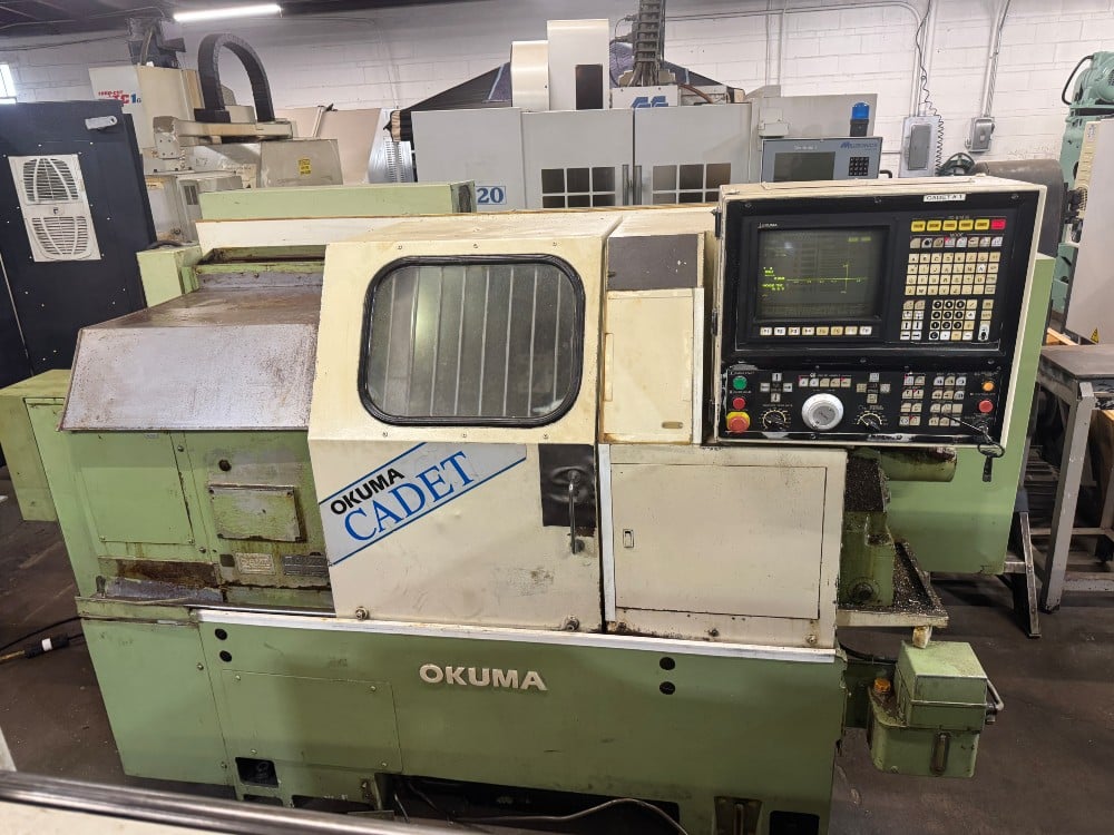 Okuma #Cadet-LNC8, CNC turning center, 15.7" swing, 10" hydraulic chuck, 3 jaw, 2.5" bore, 20.4" centers - Image 1