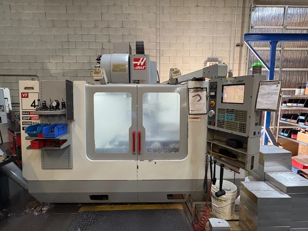 Haas #VF-4, 4th Axis, 50" X, 20" Y, 25" Z, 10,000 RPM, 20 automatic tool changer, Cat 40, Haas CNC, 2003 - Image 1