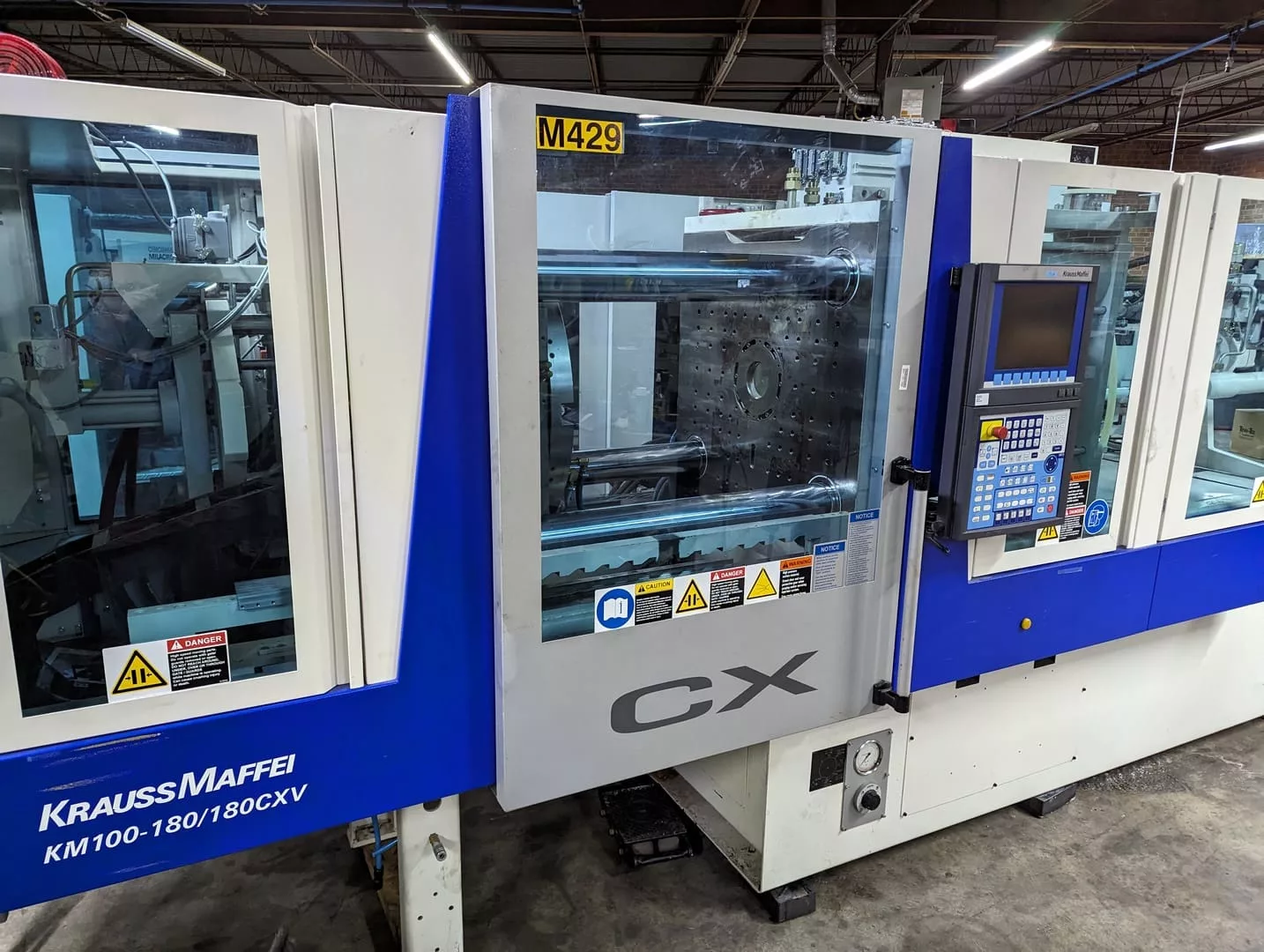 120 Ton, 1.9 oz., Krauss Maffei #100-180-180CX, two-shot injection molding machine, 20.88" x 15.52" tie bars - Image 1