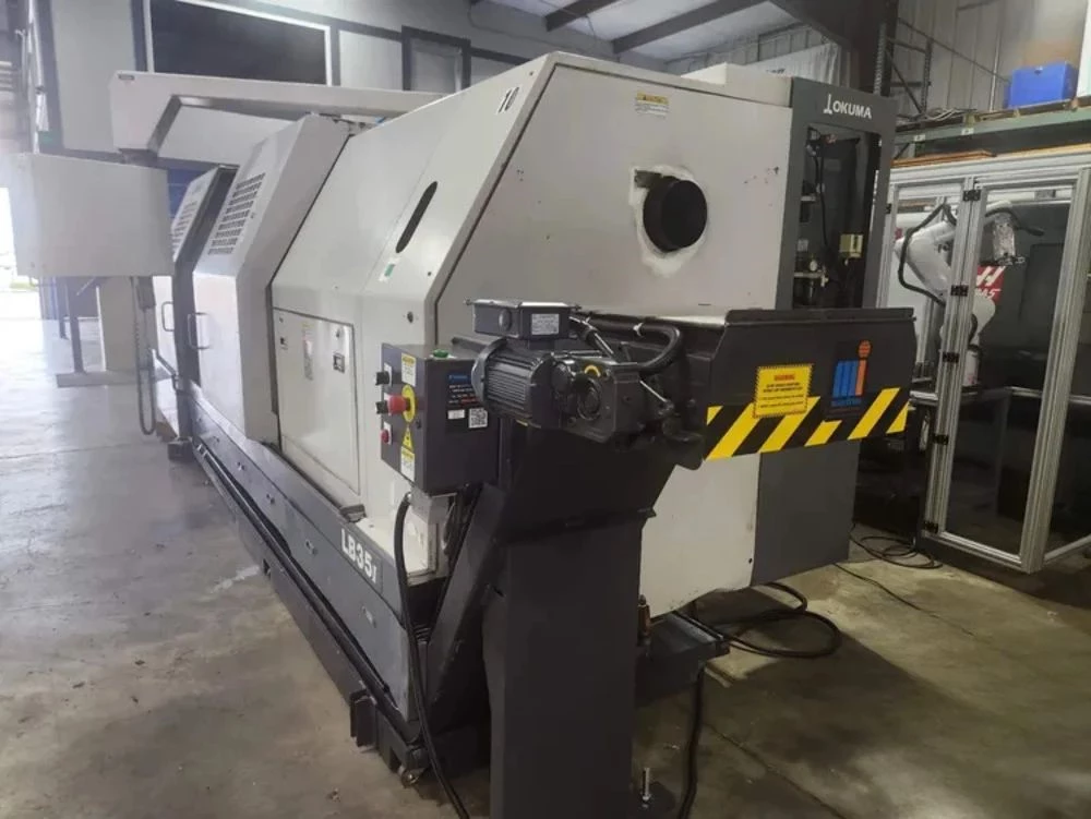 Okuma #LB-35II, CNC lathe, 27" swing, 6" bar, 20" chuck, 118" centers, 18" turning diameter, 12 station - Image 7