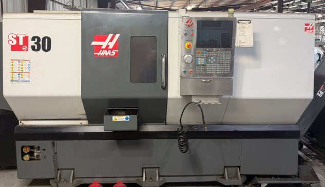 Haas #ST-30, CNC Lathe, 12.5" X, 30" Z, 31.7" swing, 30" centers, 26" turning diameter, 10" chuck, 3" bar, 30 - Image 1