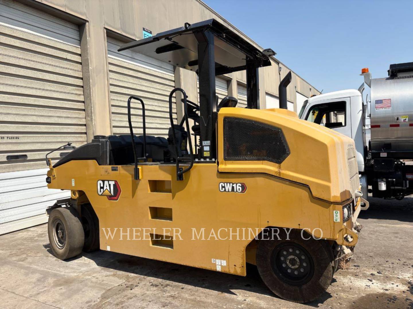 Caterpillar CW16, Pneumatic Tired Compactor, 59 hours, S/N: 69300275, 2026 - Image 1