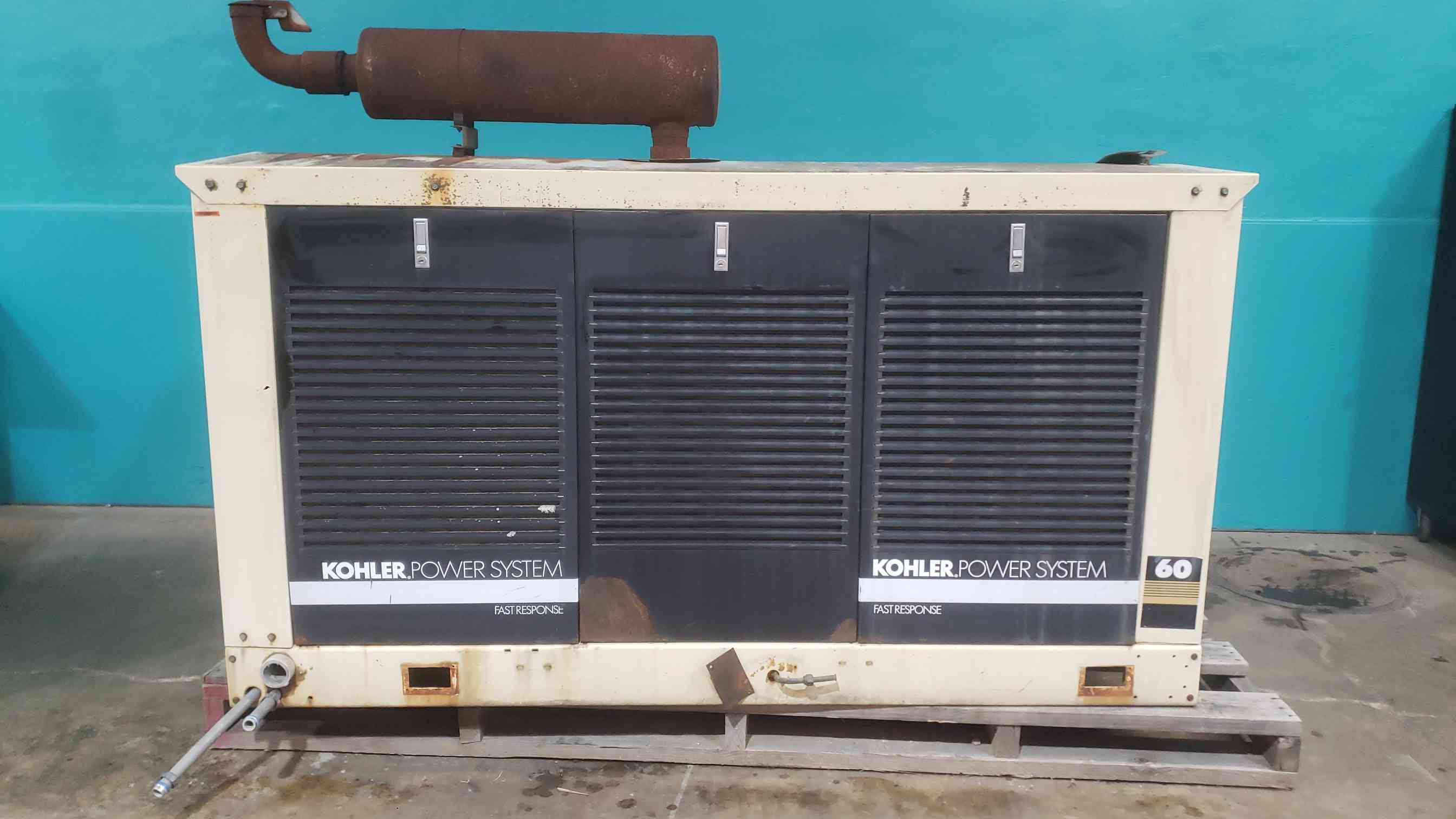 60 KW Kohler #60RZ, LP propane standby generator, Ford 7.5L engine, 1274 hours, enclosed - Image 1