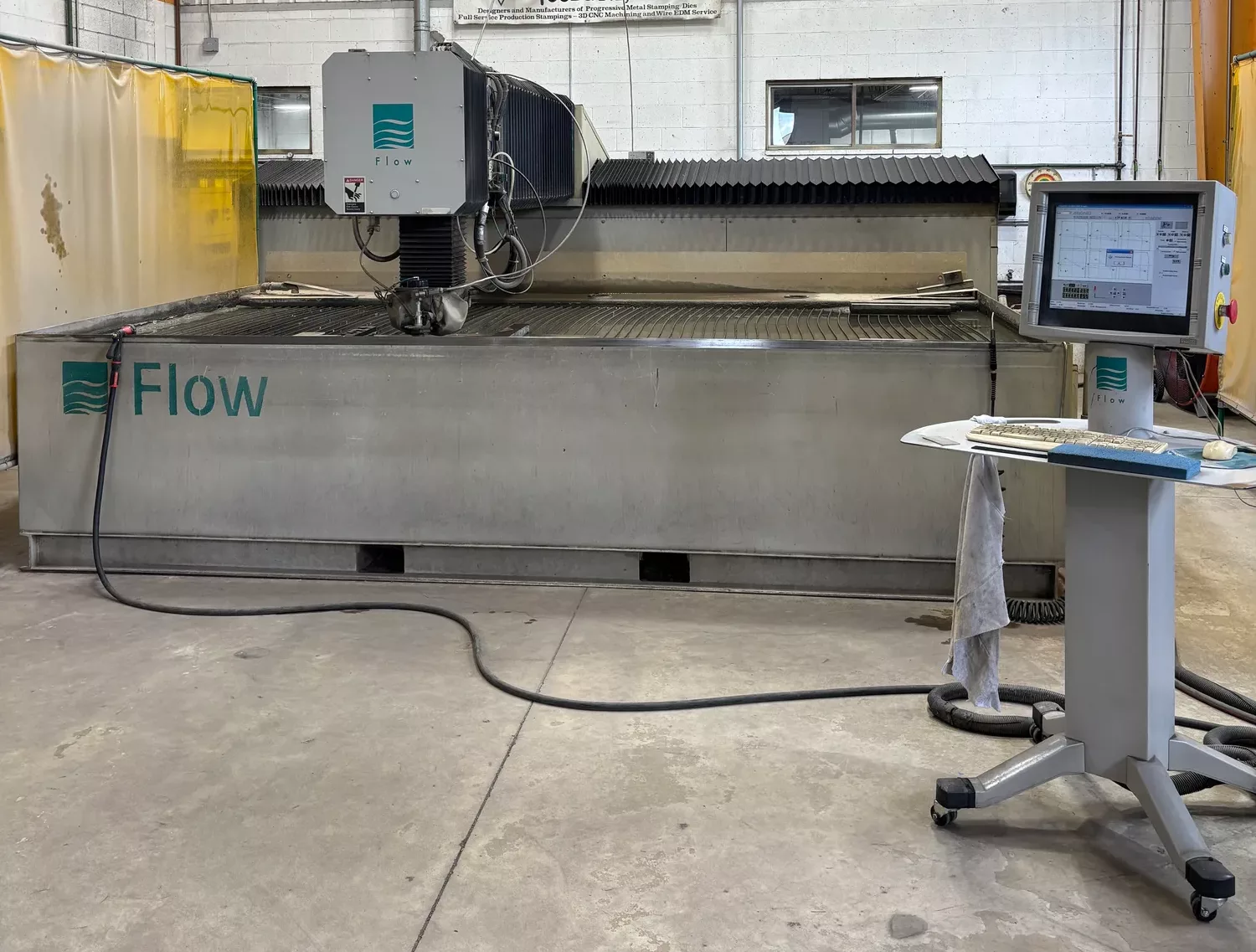 Flow #IFB-6012, Waterjet Cutter, 6' x 12' table, 87,000 psi. max. pressure, 50 HP HyperJet intensifier pump - Image 1