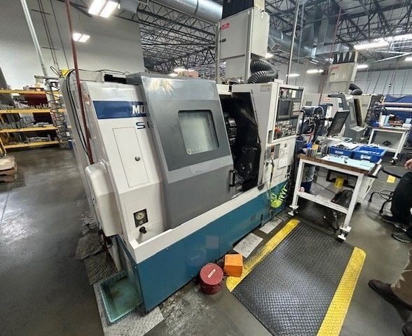 Mori Seiki #SL-150MC, CNC lathe, 24.4" swing, 16.9" turning diameter, 22.8" machining length, 6" chuck, 1.7" - Image 1