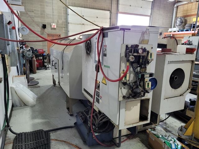 Mori Seiki #TL-40B, flat bed CNC lathe, 13.8" turning diameter, 116" Z, (2) 18" chucks, 4.6" bar, 40 HP - Image 6