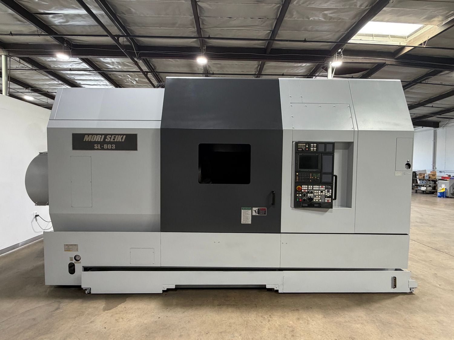Mori Seiki #SL-603C/1000, CNC lathe, 10" bar, 35.4" diameter, 39.4" length, SMW AUTOBLOK 24" air 3-jaw chuck - Image 1