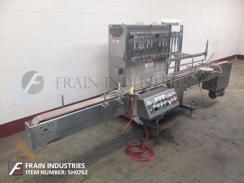 Filamatic #CVK-500, 12 head, high speed inline, automatic piston filler for free flowing, semi viscous and - Image 1