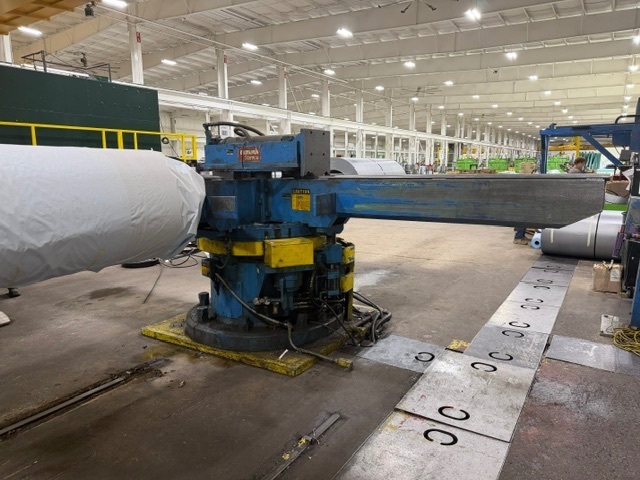 60,000 lb. Stamco, 4-arm exit turnstile, 82" arm, 49" passline, powered push-off, powered rotation, 10" x 4" - Image 1