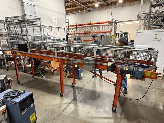 EMI, Belt Conveyor, aluminum extrusion frame, wire mesh side & hood guarding, telescoping legs on casters - Image 1