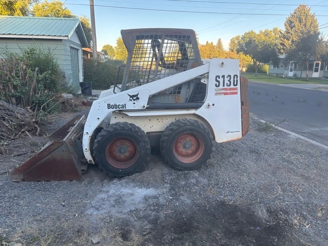 1300 lb. Bobcat #S130, skid steer loader with steel tracks included, 46 HP - Image 1