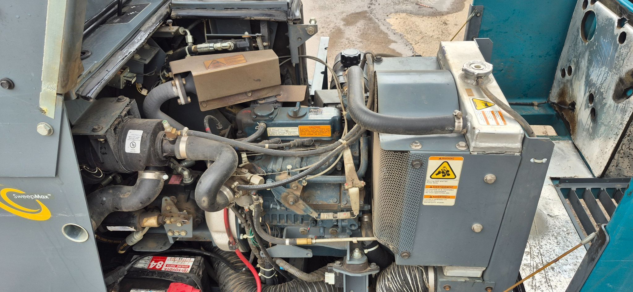 Tennant #S20, compact ride on sweeper, gas engine, 50" sweep path, 758 hours, 2012 - Image 10