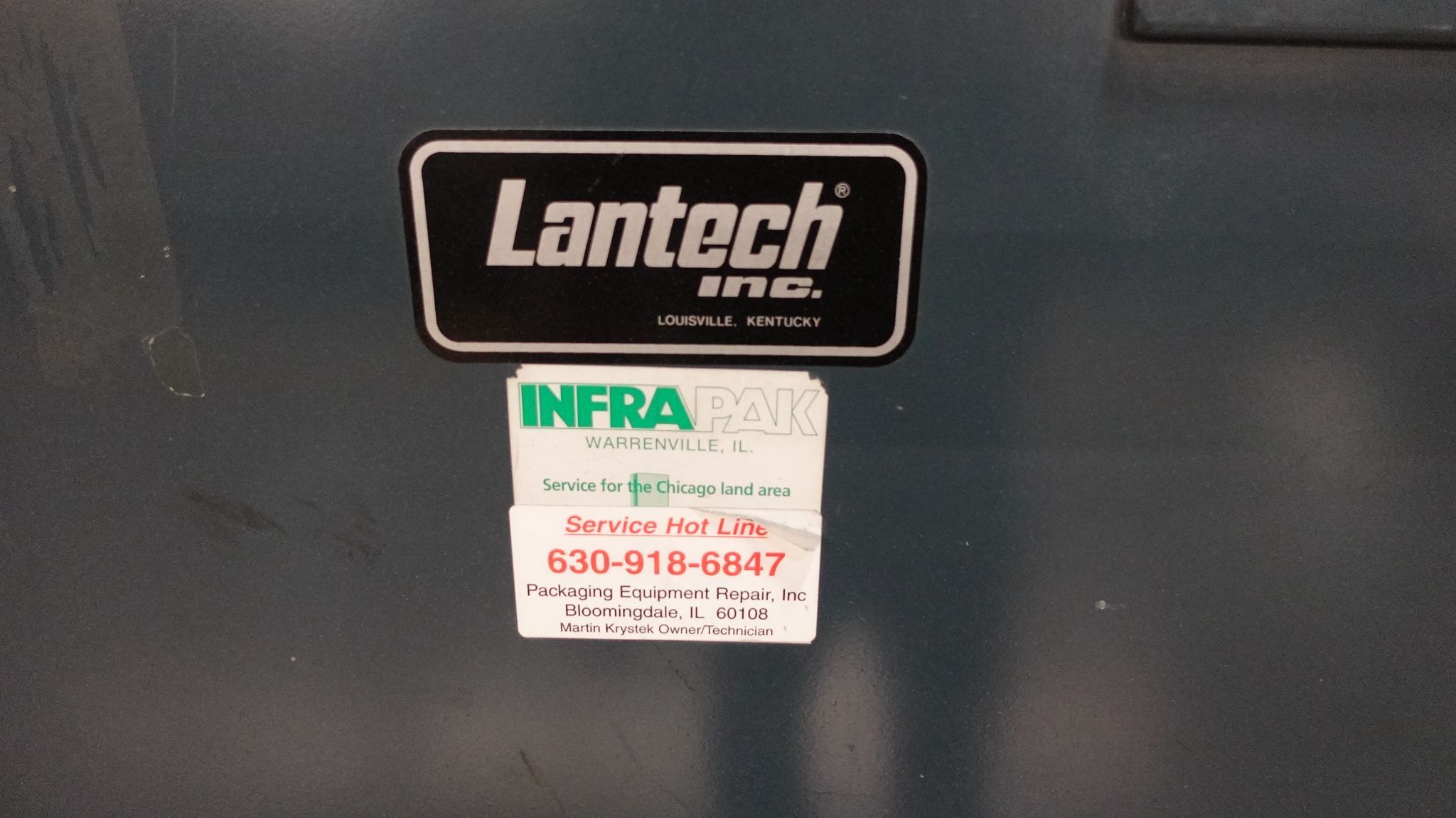 Lantech, automatic pallet stretch wrapper, conveyorized, w/ Signode compression strapping machine, powered - Image 9