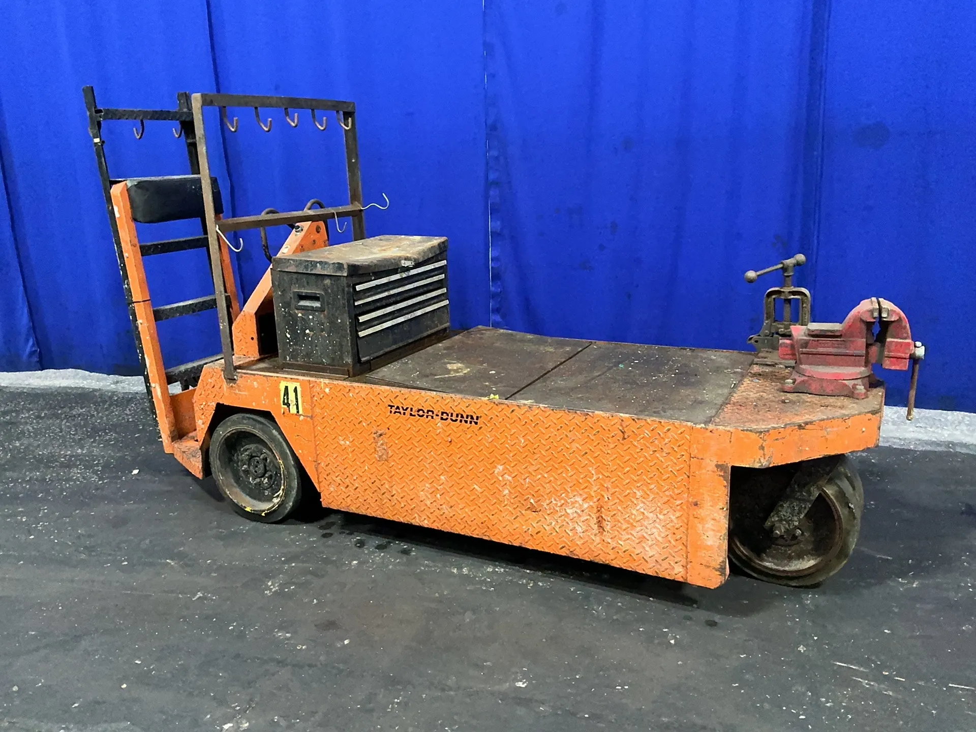 1,700 lb. Taylor-Dunn #SC1-75, order picker cart, 24 VDC, key, tool cabinet, 6" vise - Image 1